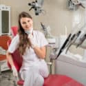 dental hygienist in dental chair