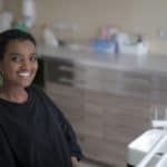 smiling woman at dentist